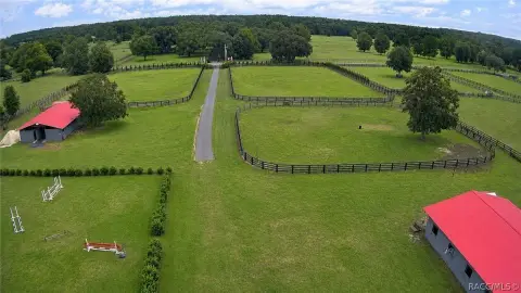 Equestrian Training Land with Barns