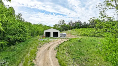 Unrestricted Land with Building, Creek