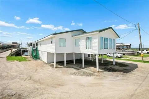 Residential Income Duplex with Sunroom