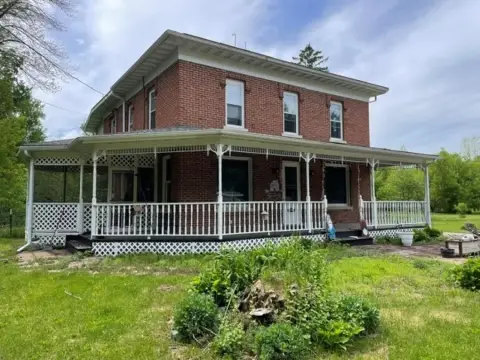 Two-Story Brick Duplex with Garage
