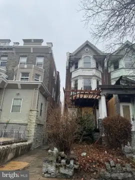 Four-Unit Colonial Twin