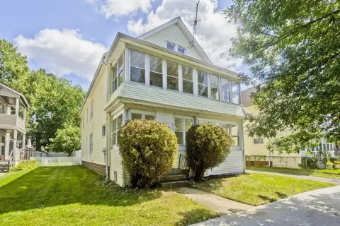 Vacant Duplex with Enclosed Porches