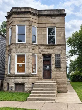 Brick Quadplex Requiring Renovation