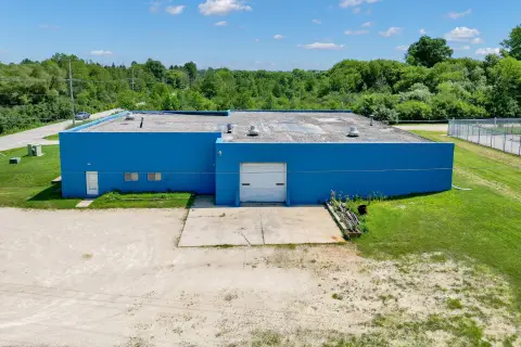 Concrete-Floor Machine Shop with Overhead Doors