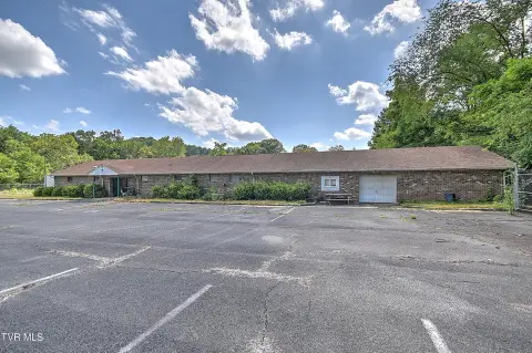 Brick Office Building on Creekside Land
