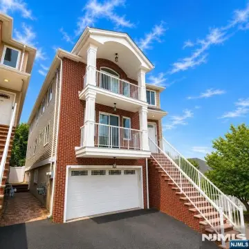 Two-Family Home with Garage Parking