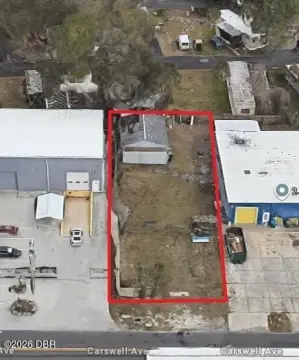 Fenced Commercial Land With Building