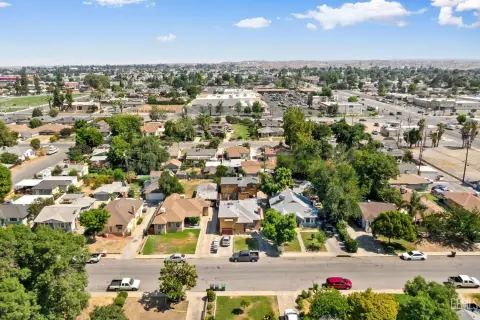 Upgraded Triplex with Detached Residence