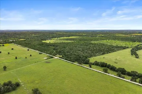 Wooded Acreage with Power Line