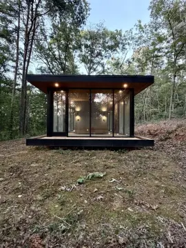 Wooded Resort Development with Glass Cabins
