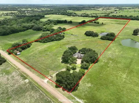 Ranch Property with Pond and Barns