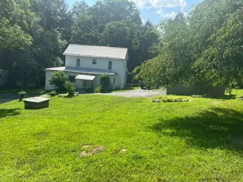 Detached Farmhouse on Acreage