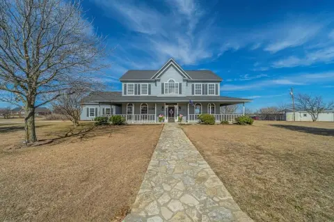 Charming Farmhouse on Spacious Acreage