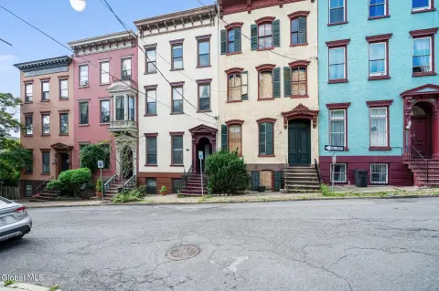Brick Triplex with Carriage House