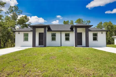 Duplex with Impact-Resistant Windows