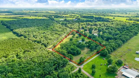 Fenced Acreage with Pond and Shop
