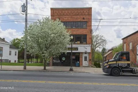 Four-Story Riverfront Mixed-Use Building