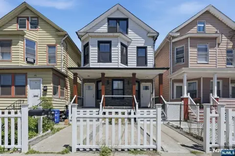 Renovated Side-by-Side Two-Family Home
