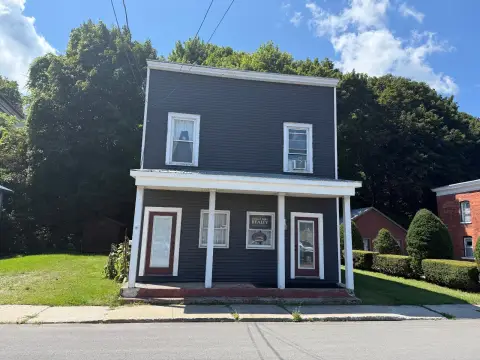 Mixed-Use Building with Apartment