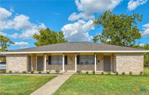 Occupied Duplex with Carport