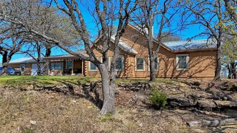 Nocona Ranch with Custom Log Home