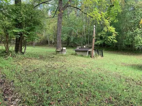 Undeveloped Land with Renovation Project