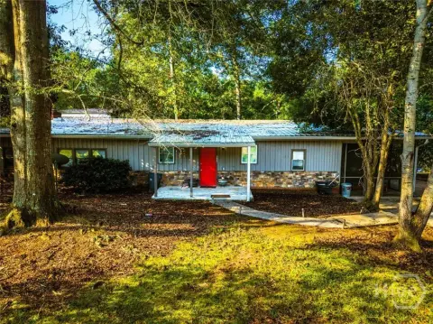 Wooded Riverfront Triplex