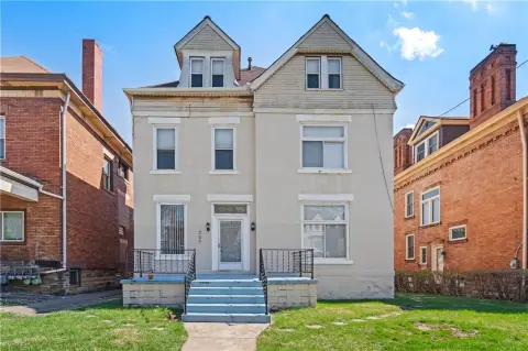 Brick Triplex with Off-Street Parking