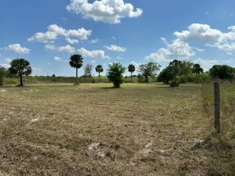 Cleared Agricultural Land with Pond