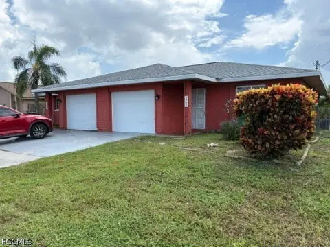 Duplex with Garages and Fenced Yards