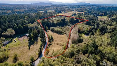 Expansive Vacant Land with Pond