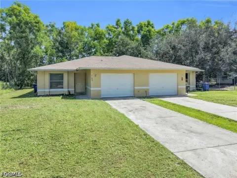 Concrete Block Duplex With Garages