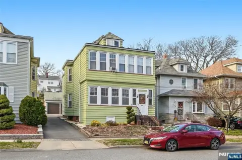 Spacious Two-Family Home with Garage
