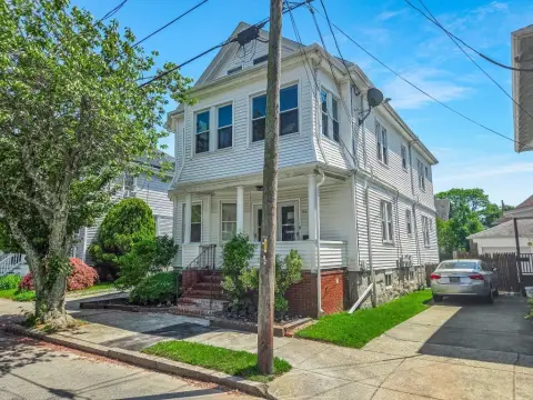 Two-Family Residence with Enclosed Porch