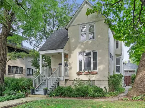 Stucco Triplex with Coach House