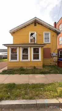 Two-Family As-Is Renovation Opportunity