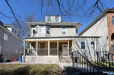 Updated Three-Family Home in Newark