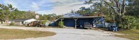 Automotive Salvage Yard With Repair Garage