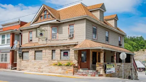 Thriving Bar/Restaurant with Rental Income