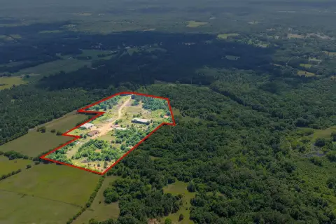 Commercial Land With Existing Buildings