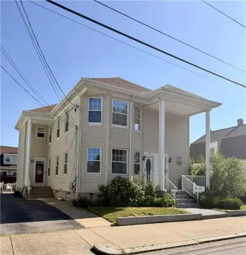 Two-Family Home with Fenced Yard