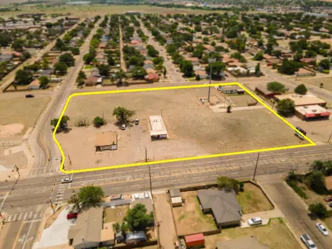 Commercial Land with Retail Buildings