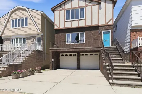 Two-Unit Brick Tudor Home