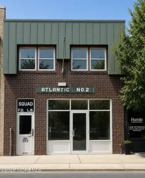 Former Firehouse Building with High Ceilings
