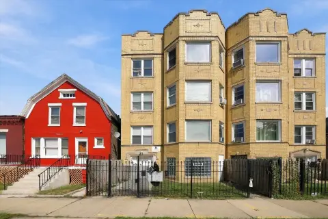Brick Three-Unit Residential Property