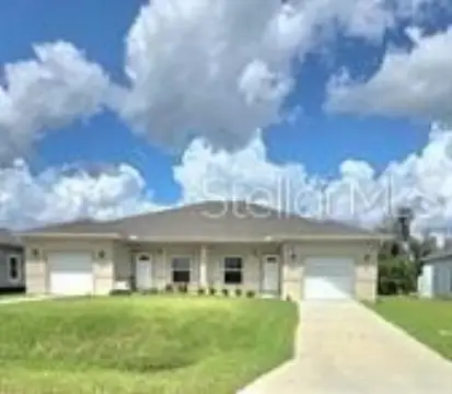 Duplex with Two Private Garages