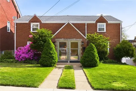 Side-by-Side Duplex With Integral Garages