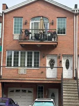 Spacious Gravesend Three-Family Brick Home