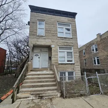 Frame Apartment Building with Coach House