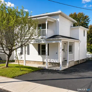 Updated Three-Family Residence